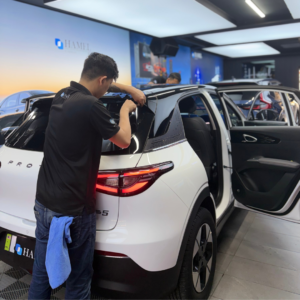 Professional window tint film cutting process at HAMEL Kepong Kuala Lumpur