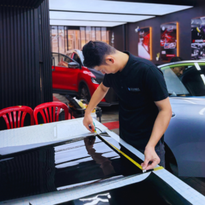Professional window tint film cutting process at HAMEL Kepong Kuala Lumpur